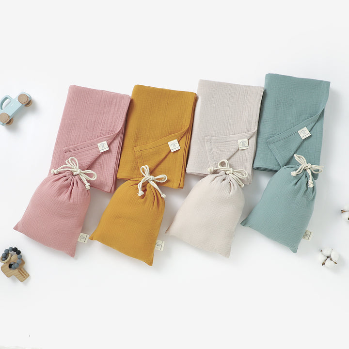 Organic cotton muslin swaddle with bag, 120 × 120 cm